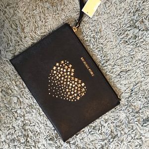 Micheal Kors hand clutch